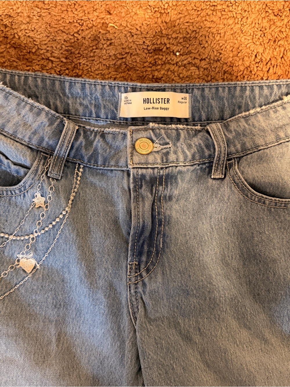 Hollister Light Blue Low-Rise Boyfriend Jeans with Chain & Star Detail